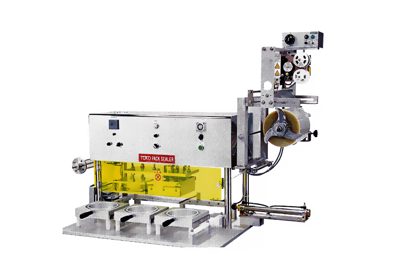 パックシーラー機